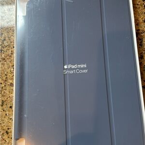Brand new never used mini IPAD cover